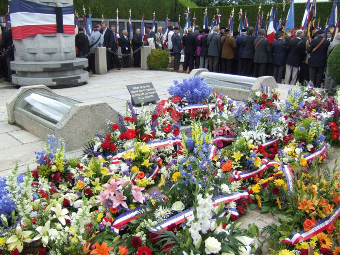The tributes laid in front of the main memorial at the cemetery