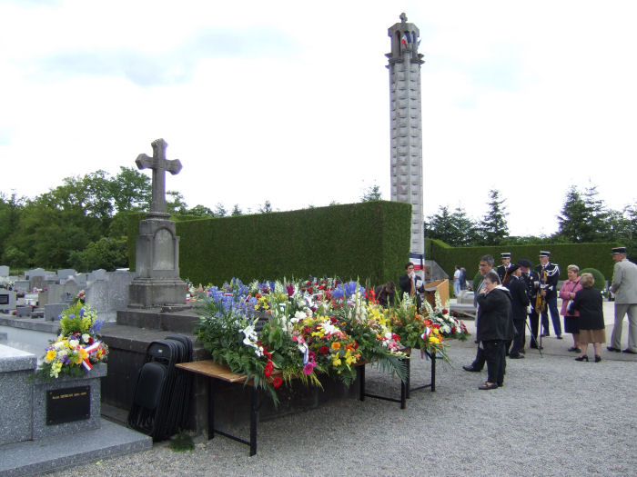 Floral tributes prior to being laid in front of the main memorial
