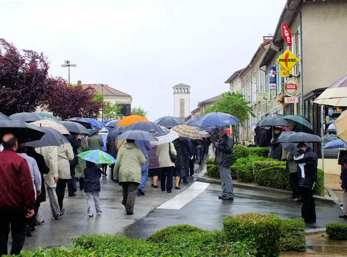 The procession from the school to the World Wars memorial in Oradour-sur-Glane