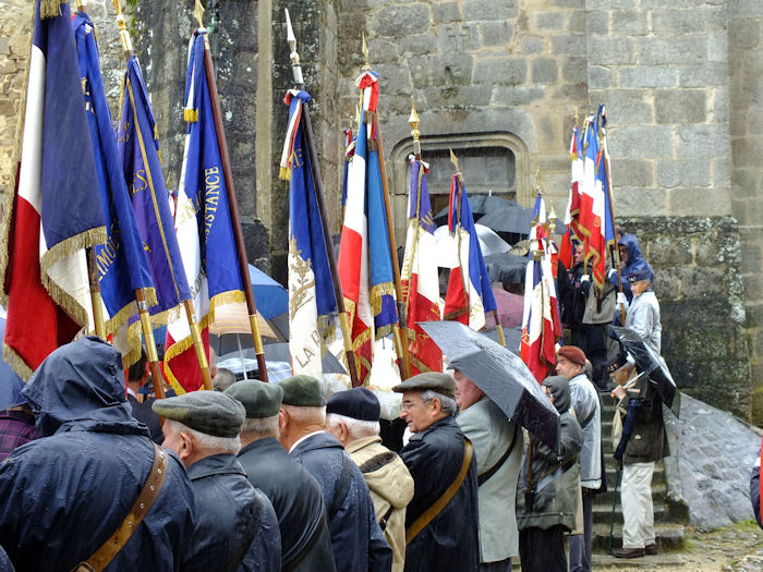 Procession entering the old church of Oradour-sur-Glane