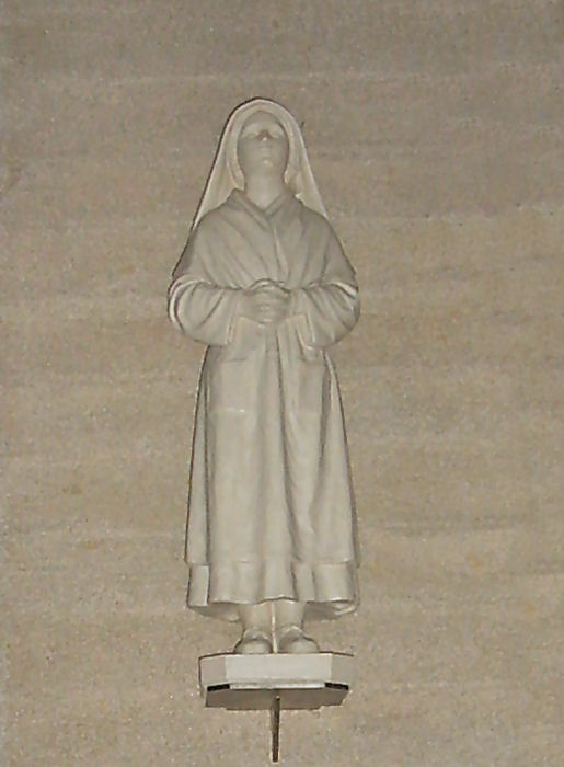 Statue of St. Bernadette in Oradour new church