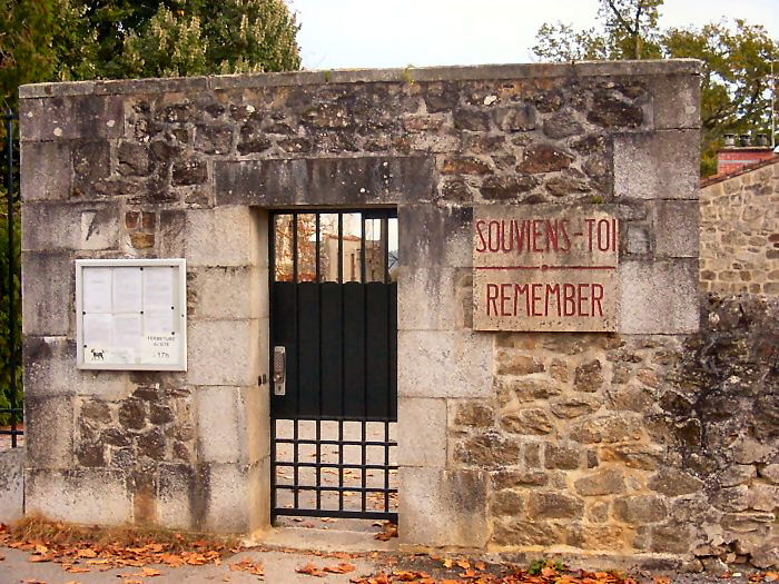 Old northern entrance to Oradour showing the Souviens-Toi : Remember! notice