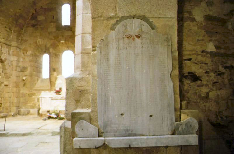 Memorial to W.W.I and altar in church at Oradour